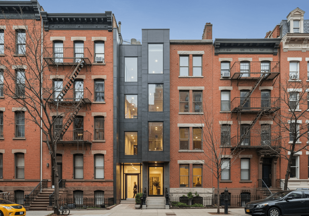A modern townhouse seamlessly integrated into a block with a mix of architectural styles, showing how contemporary design can complement existing neighborhoods.